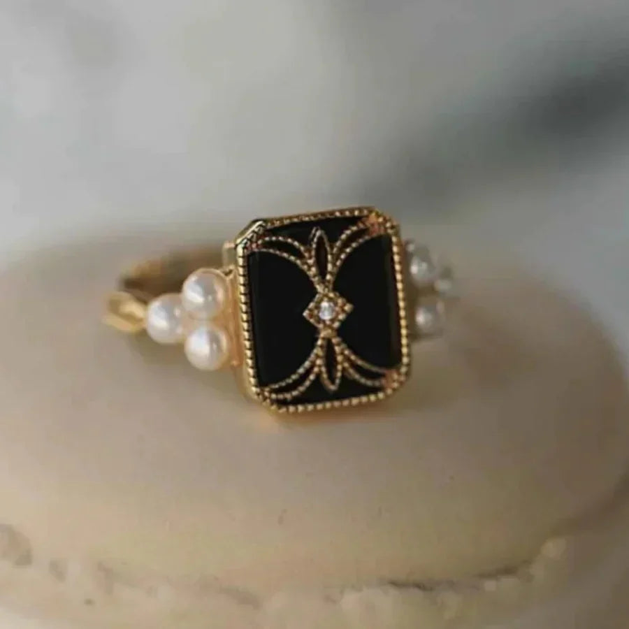Anillo dorado de perla negra antigua | Oro