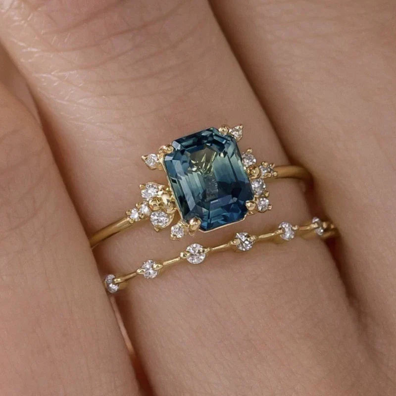 Sæt med ringe med krystalblå glans | Guld