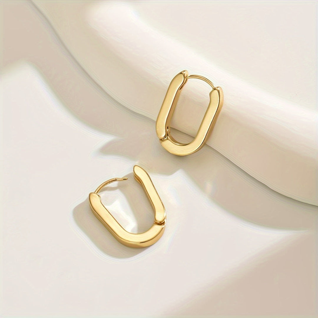 Pendientes de aro dorados geométricos