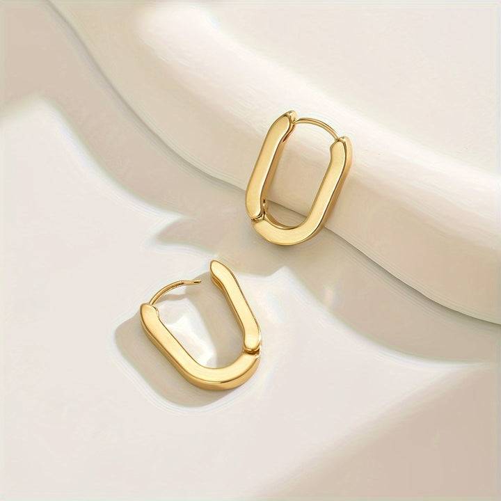 Pendientes de aro dorados geométricos