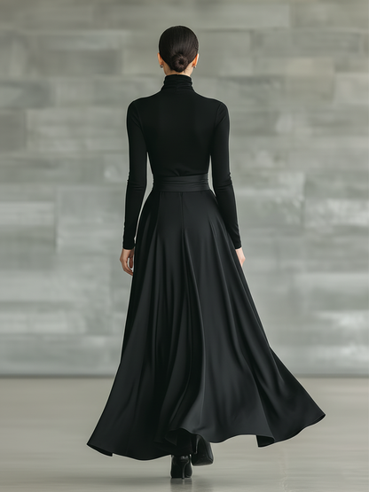 Vestido longo feminino preto, de gola alta, malha de alta elasticidade e tecido acetinado, com saia evasê