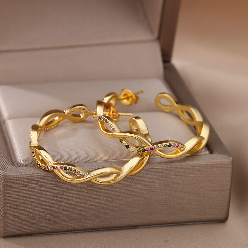 Julenyssa | Wave øreringe 18K guld