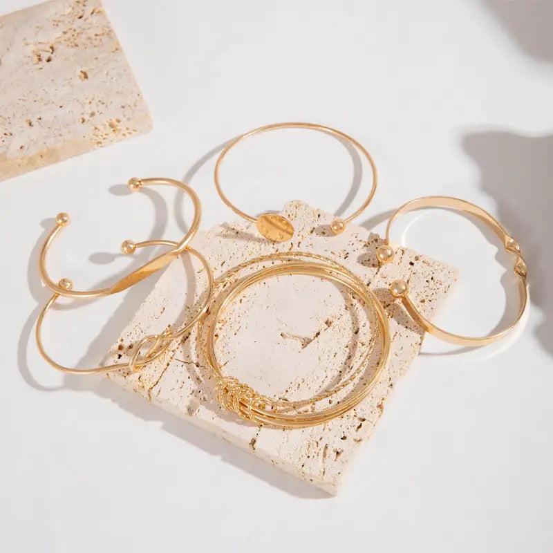 Juego de pulseras de elegancia anudada | Dorado