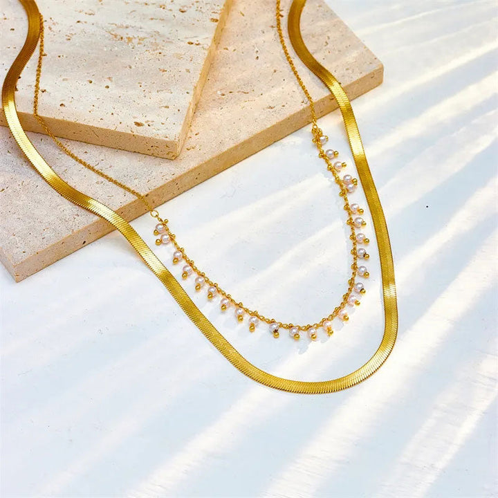 Marizanne | Conjunto de joyería de serpiente de lujo y perlas con choker en oro 18K