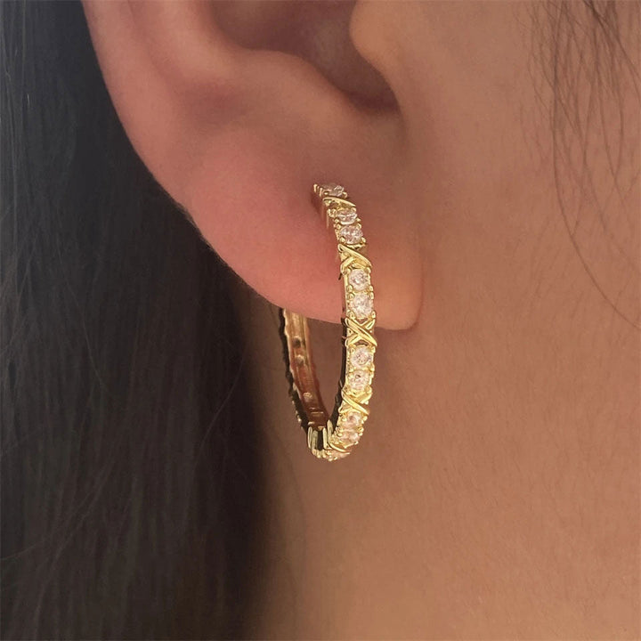 Aurelisse | Zirconia korsøreringe i 18K guld