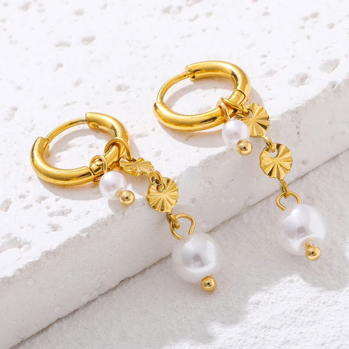 Lyannette | Sunburst øreringe i 18K guld