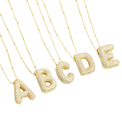 Conjunto de collares con iniciales de letras abombadas | Dorado