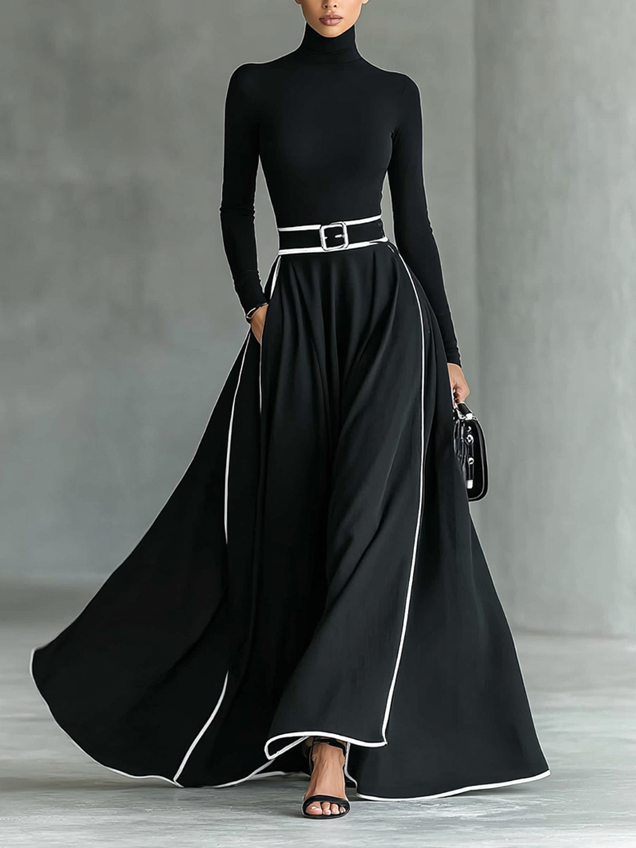 Damen-Maxikleid in Schwarz mit weißen Ziernähten, Stehkragen, langen Ärmeln und engem Taillengürtel