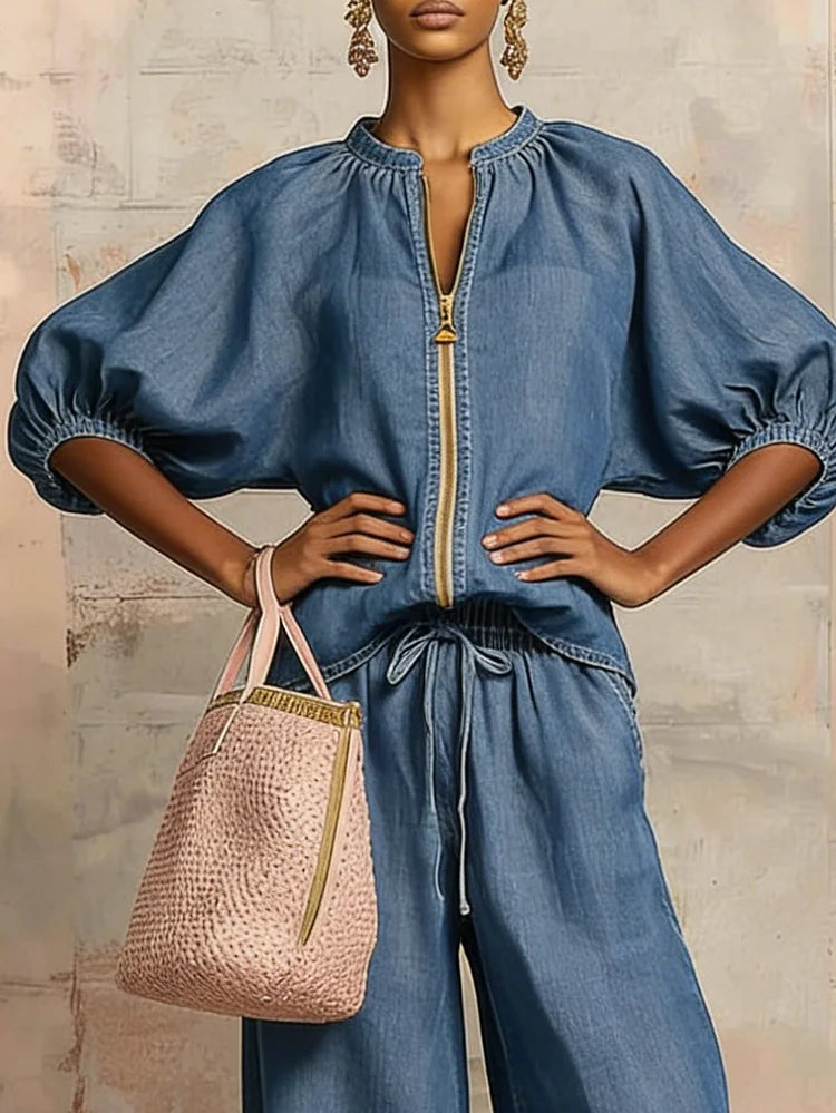 Souprava s topem na zip a džínovými širokými nohavicemi