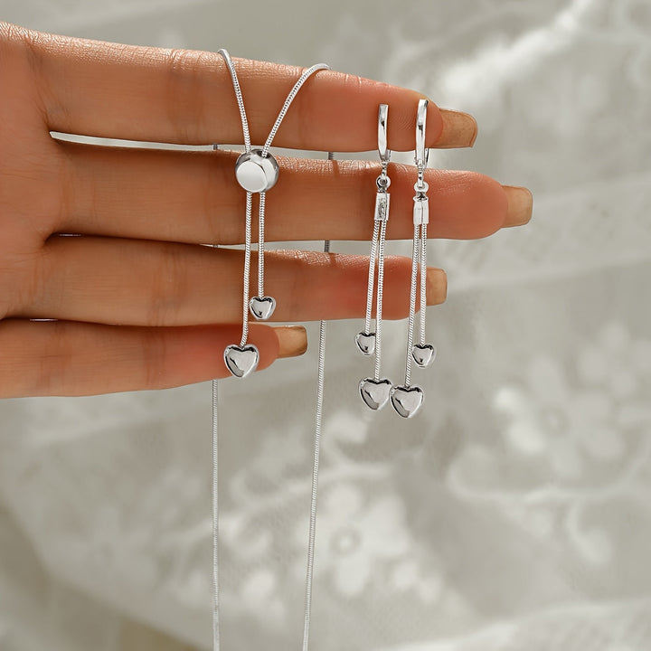 Conjunto de collar con colgante de corazón ajustable y pendientes