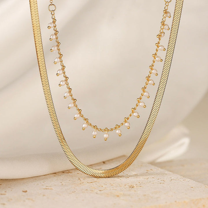 Marizanne | Conjunto de joyería de serpiente de lujo y perlas con choker en oro 18K