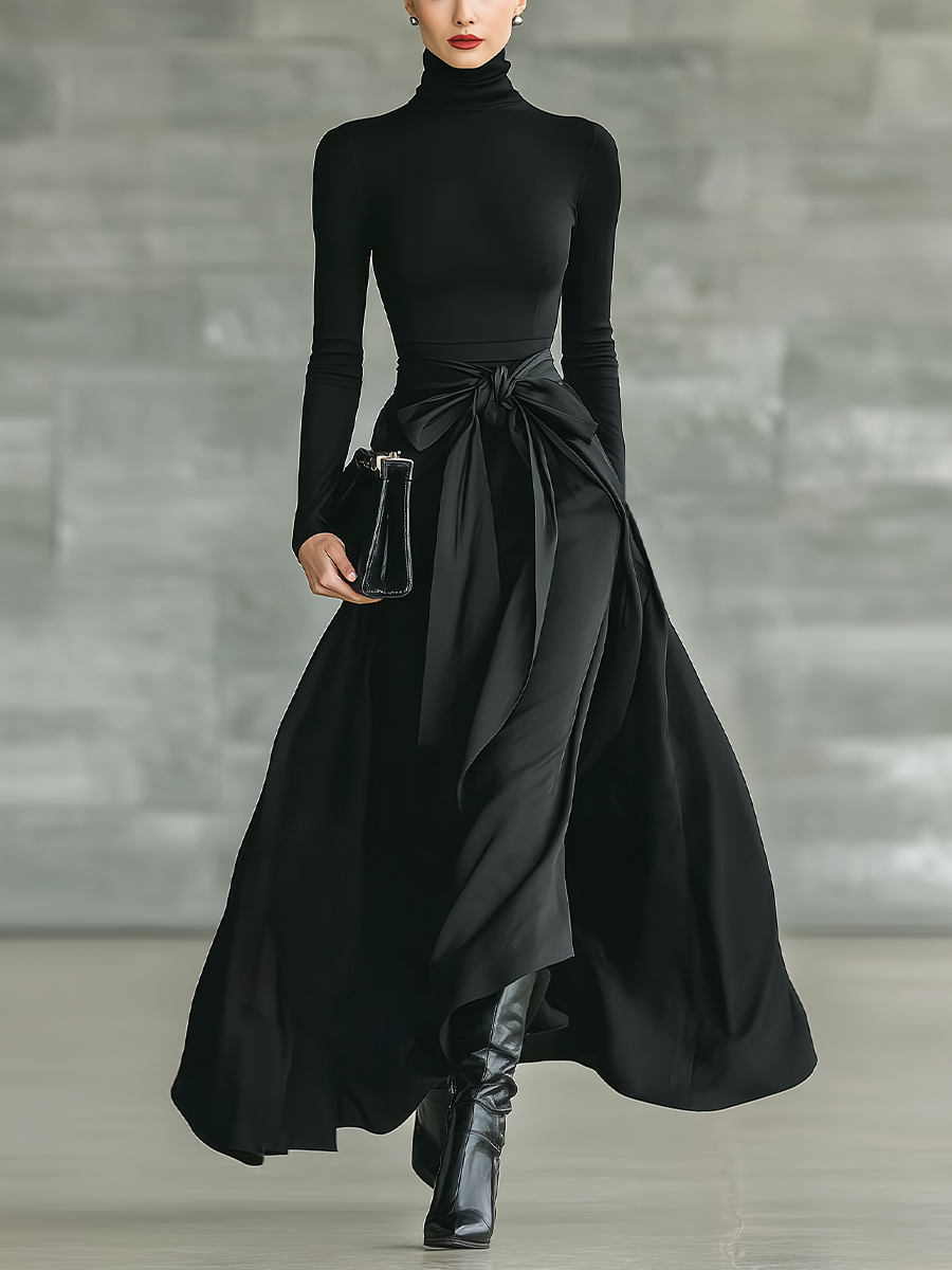 Vestido longo feminino preto, de gola alta, malha de alta elasticidade e tecido acetinado, com saia evasê