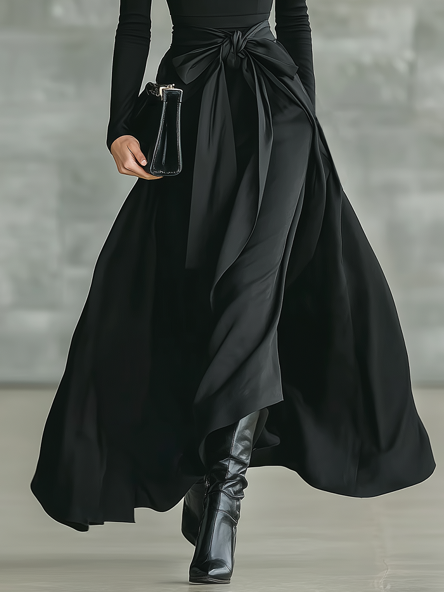Vestido longo feminino preto, de gola alta, malha de alta elasticidade e tecido acetinado, com saia evasê