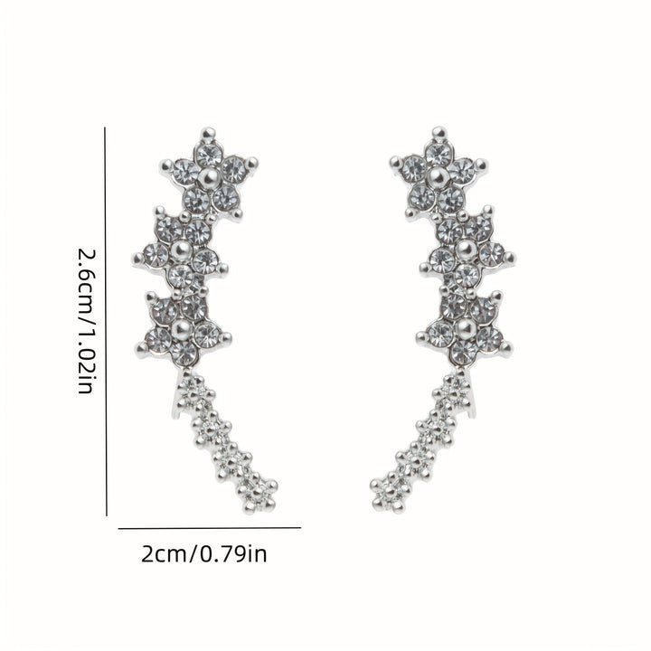 BRINCOS DOURADOS FLORAIS COM CRISTAIS RHINESTONE