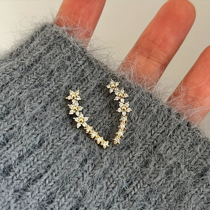 Pendientes dorados con flores y pedrería rhinestone