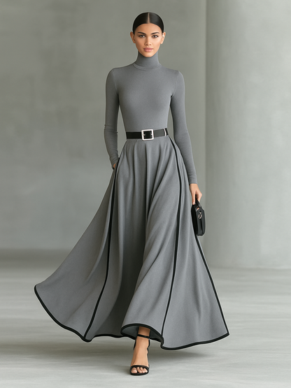 Damen-Maxikleid in Schwarz mit weißen Ziernähten, Stehkragen, langen Ärmeln und engem Taillengürtel