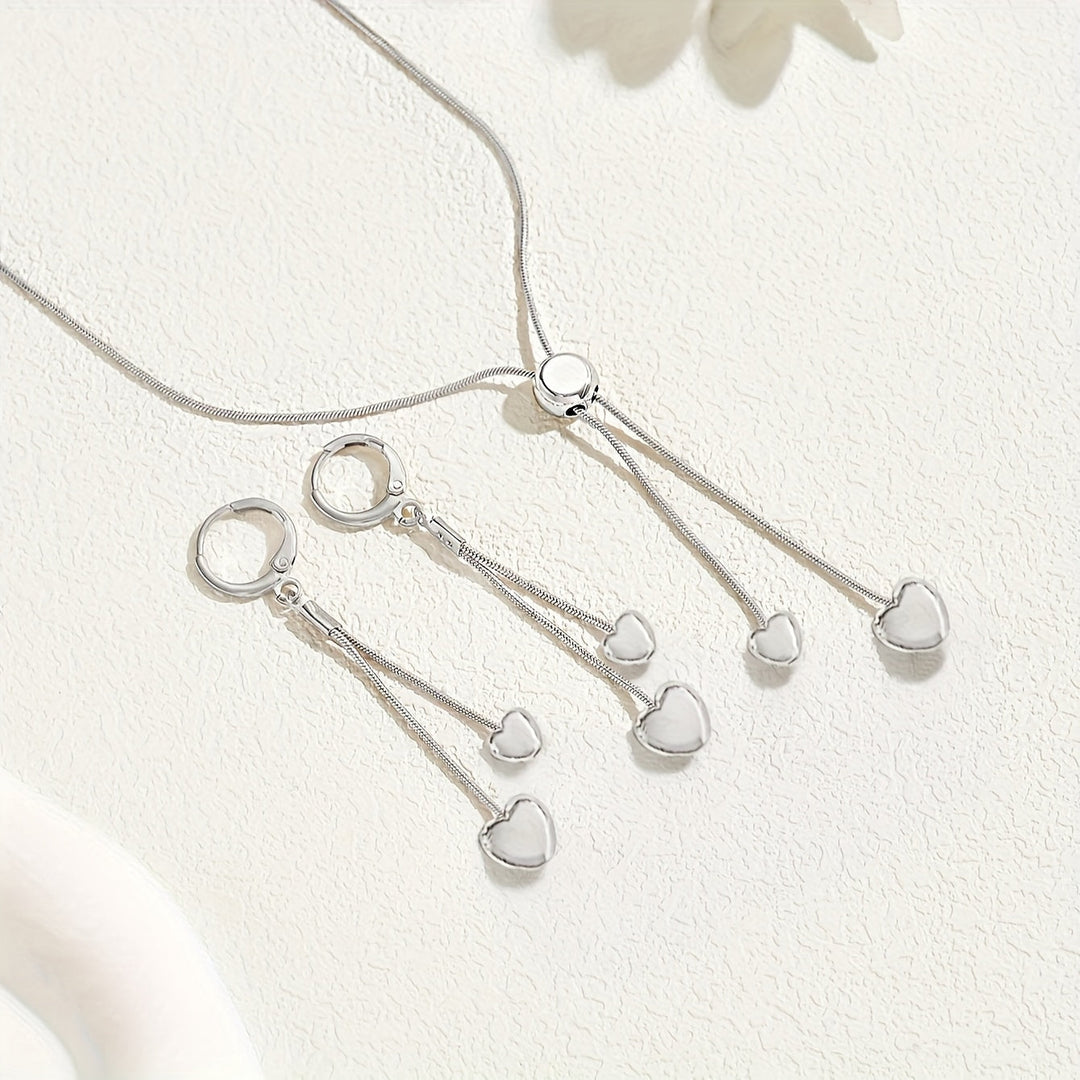Conjunto de collar con colgante de corazón ajustable y pendientes