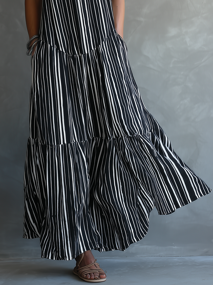 Women's Black And White Vacation Style Striped Maxi Dress With Halter Neckline & Tiered Skirt