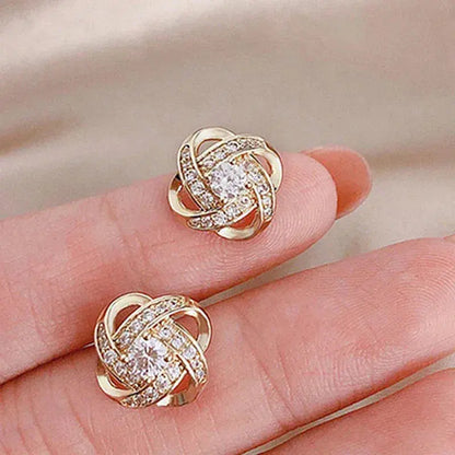 Pendientes dorados en espiral floral