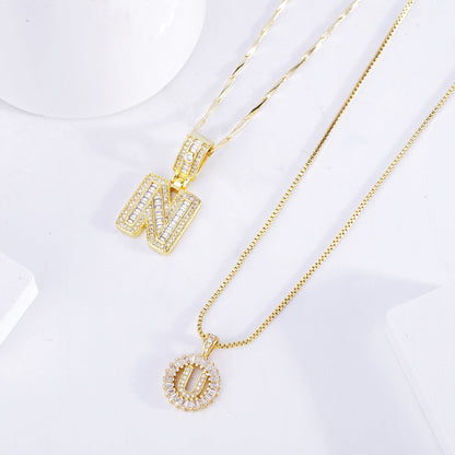 Conjunto de collares con inicial y pavé | Dorado