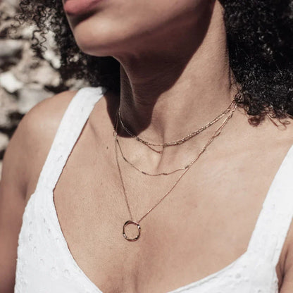 Collar de tres filas con círculos abiertos | Dorado