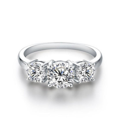 Anillo Clare de triple piedra | Oro blanco