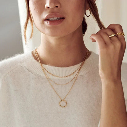 Collar de tres filas con círculos abiertos | Dorado