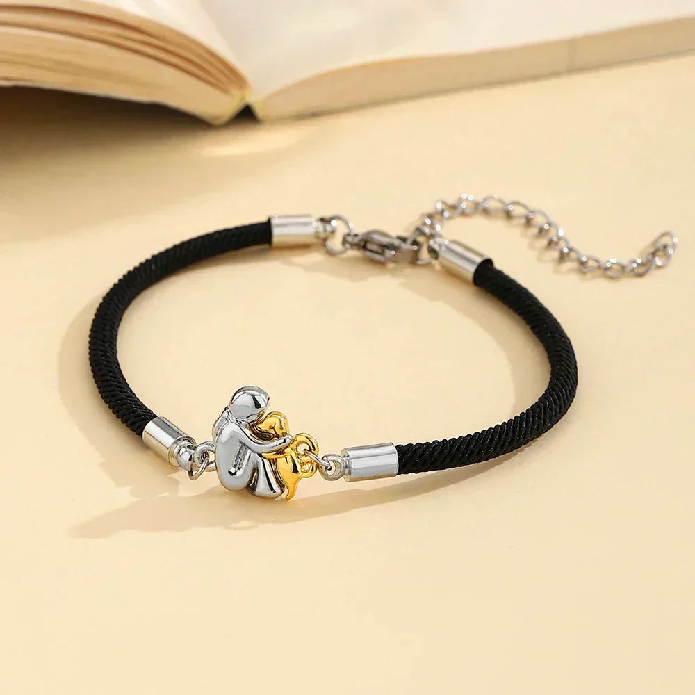 LIORA | PULSEIRA DE CORDÃO COM ÍCONE DE CACHORRO