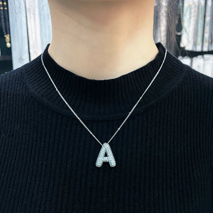 Juego de collares con iniciales de letras burbuja | Oro blanco