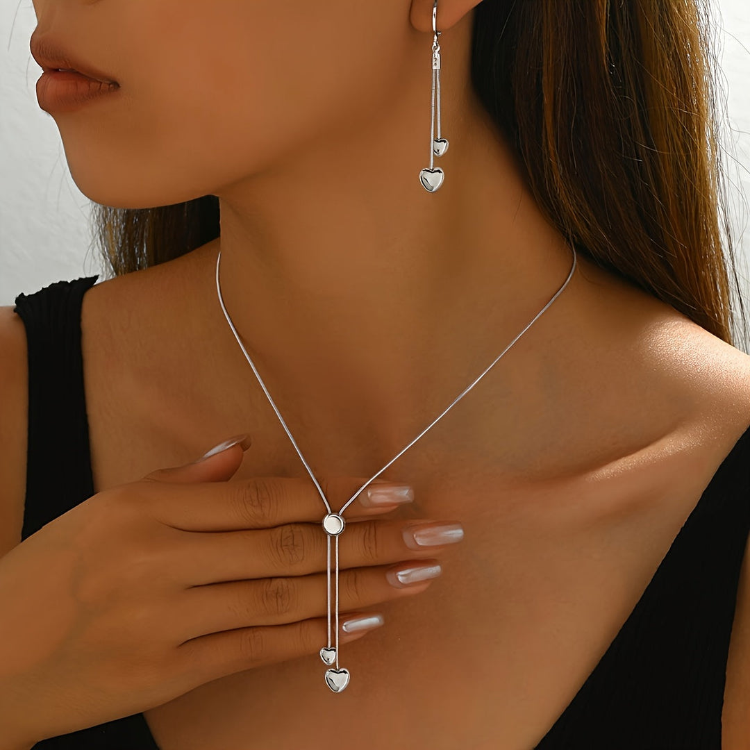 Conjunto de collar con colgante de corazón ajustable y pendientes