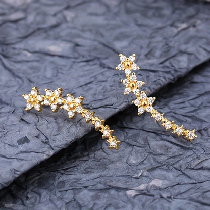 Pendientes dorados con flores y pedrería rhinestone
