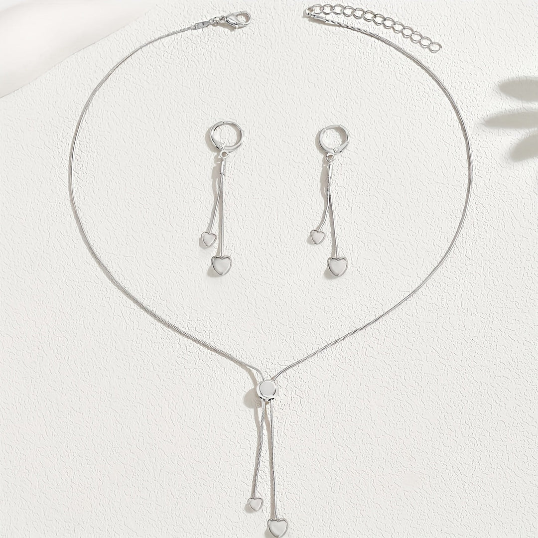 Conjunto de collar con colgante de corazón ajustable y pendientes