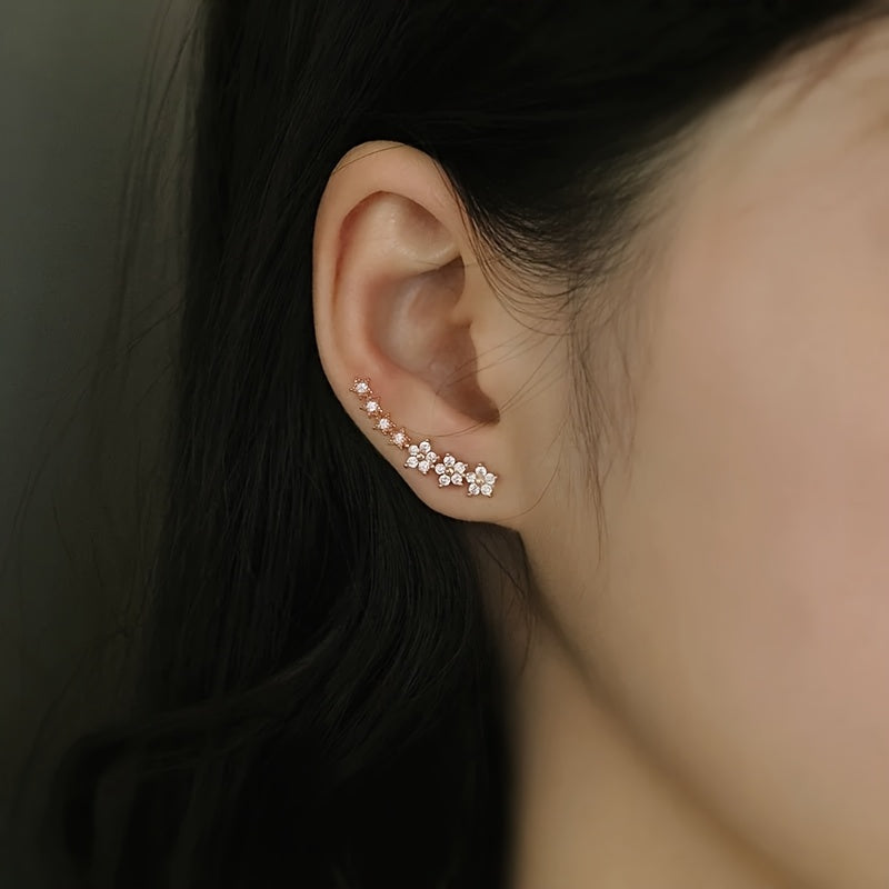 Pendientes dorados con flores y pedrería rhinestone