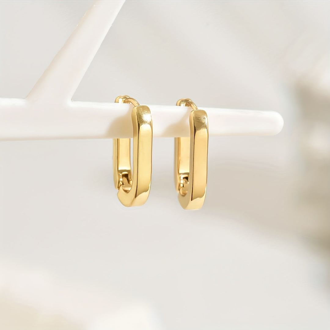 Pendientes de aro dorados geométricos