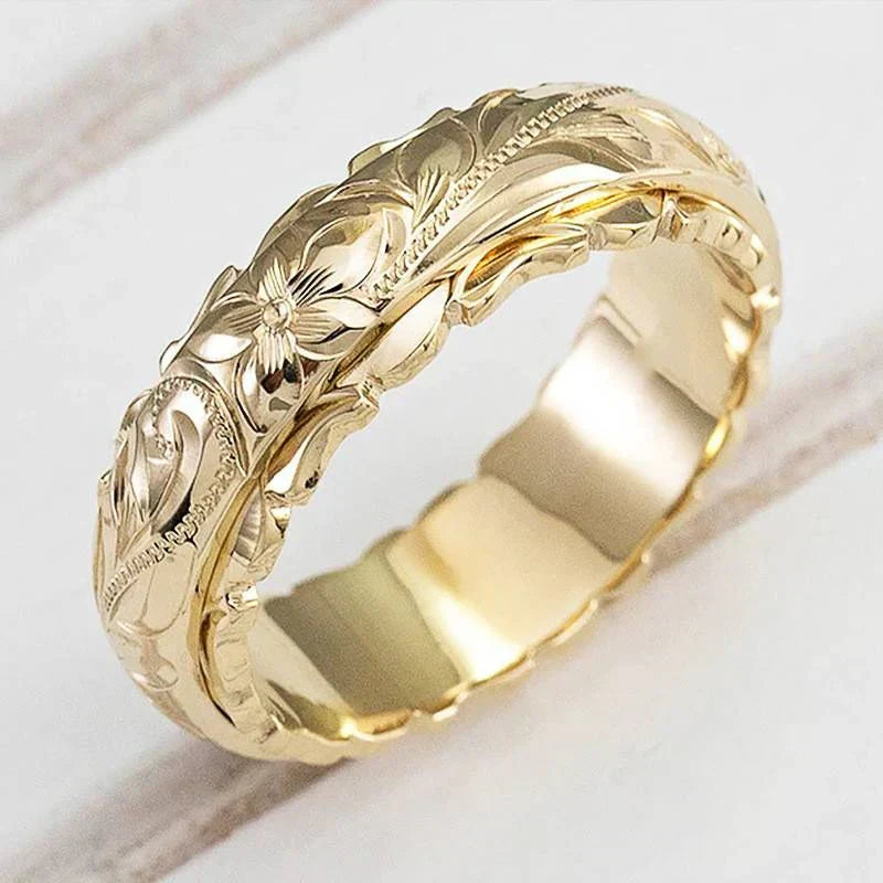 Antikguldring med blomst | Guld