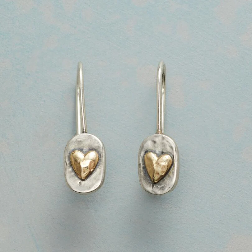 Pendientes de plata y oro en forma de corazón