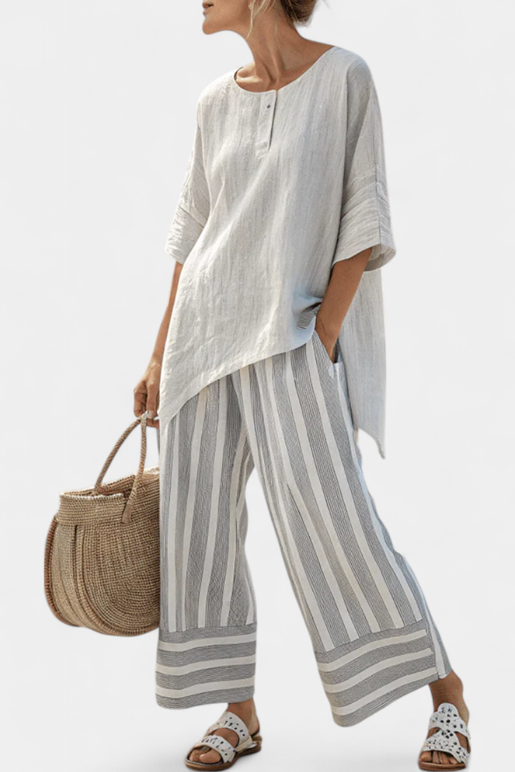 Talvora | Elegant asymmetrisk bluse og stribede bukser
