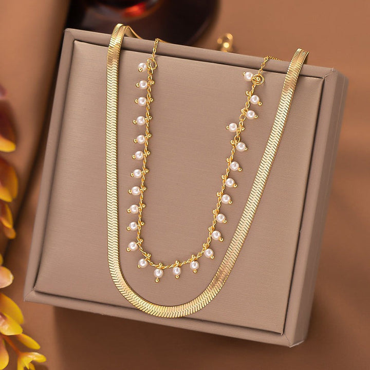 Marizanne | Conjunto de joyería de serpiente de lujo y perlas con choker en oro 18K
