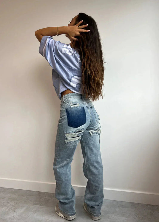 Lívia - Calça Jeans Rasgada Vintage